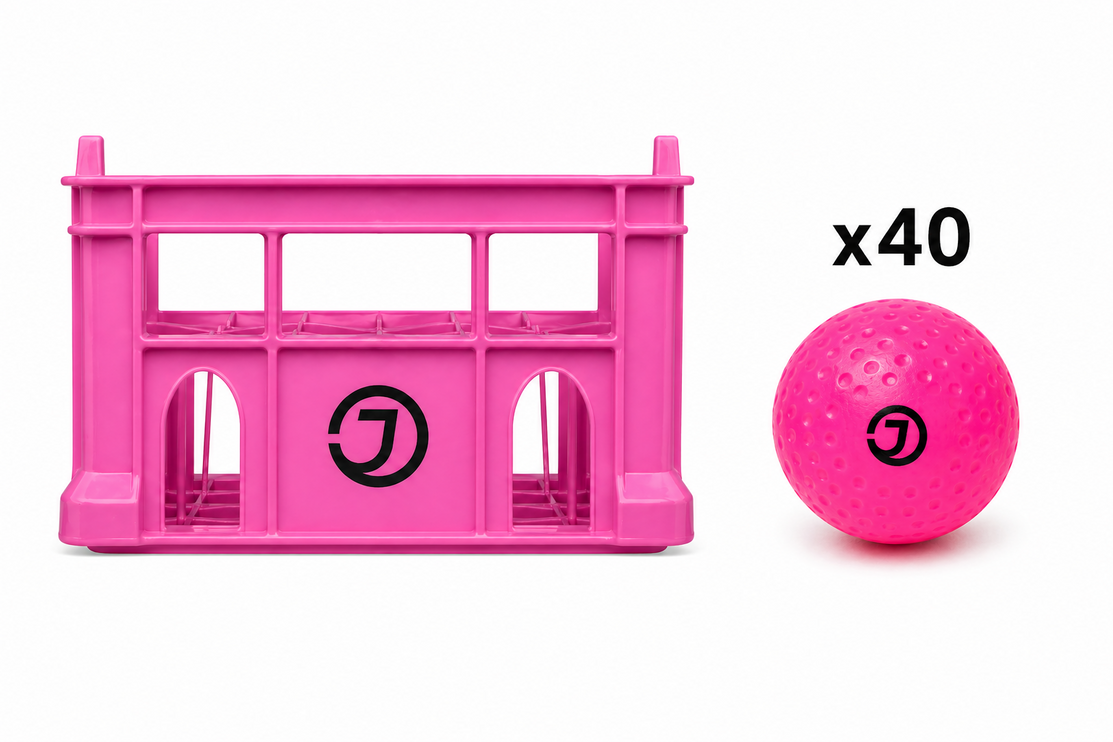 Justa Pink Light Practice Ball Bundle 2026/27 | 40 lightweight pink hockey balls inside a professional rigid storage crate
