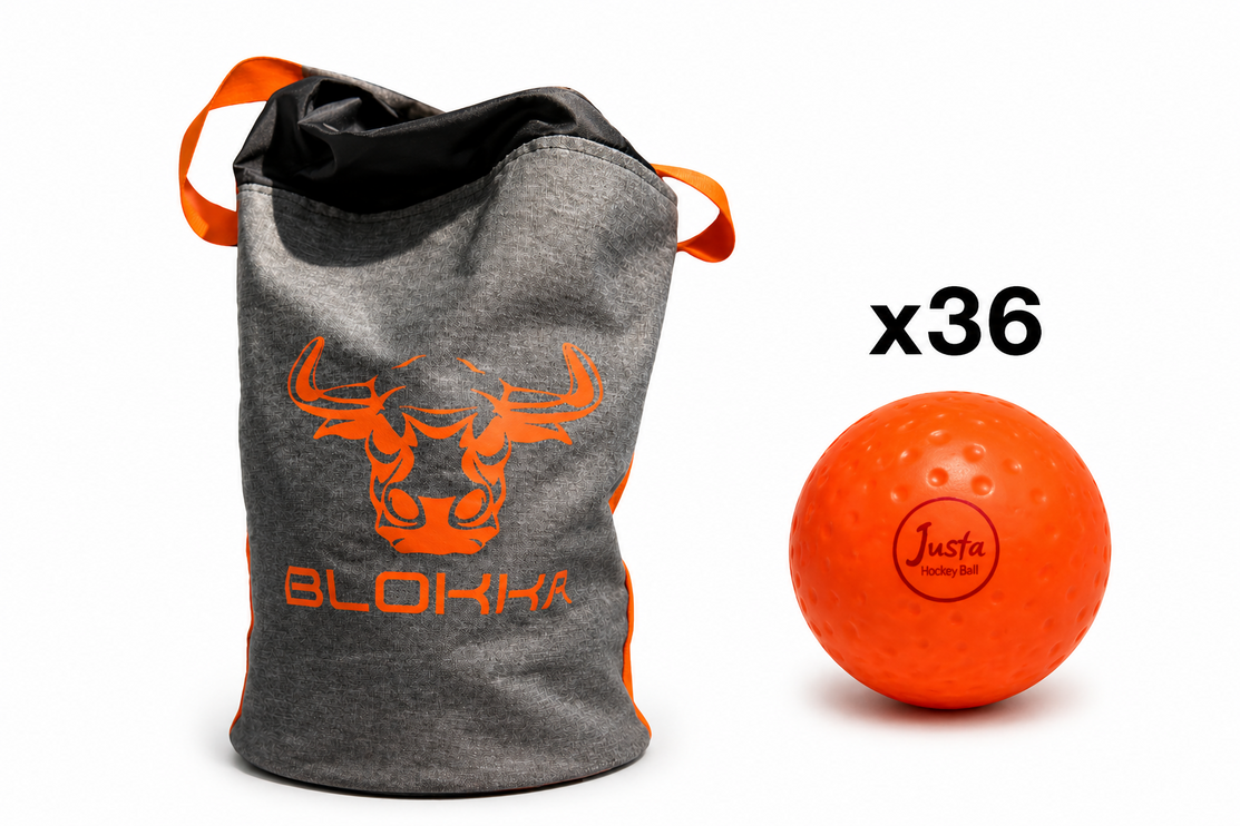 Justa Orange Practice Ball Bundle 2026/27 | 36 orange hockey balls arranged next to a professional storage bag