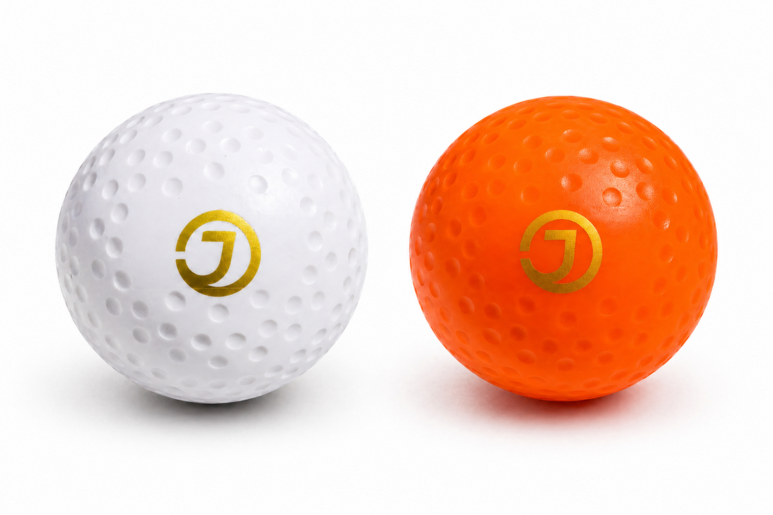 Justa Double Dimple Match Hockey Balls in White and High-Visibility Orange | Professional 5.5oz PU Match Spec