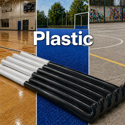A vibrant assortment of plastic hockey sticks in various lengths and bright colours