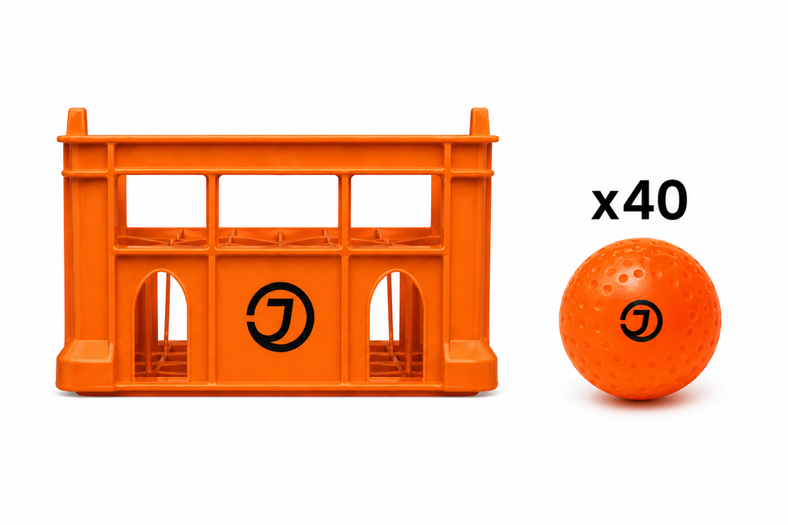 Justa Orange Light Practice Ball Bundle 2026/27 | 40 lightweight orange hockey balls inside a professional rigid storage crate